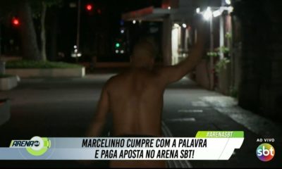 Marcelinho pagando aposta ao vivo no Arena SBT. Foto reprodução